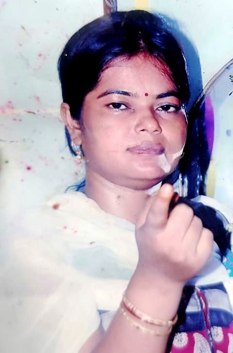 Woman strangled to death and packed in bed
